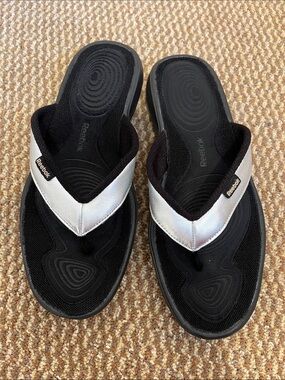 Reebok Women's Black Footbed with Silver Strap Flip Sandals